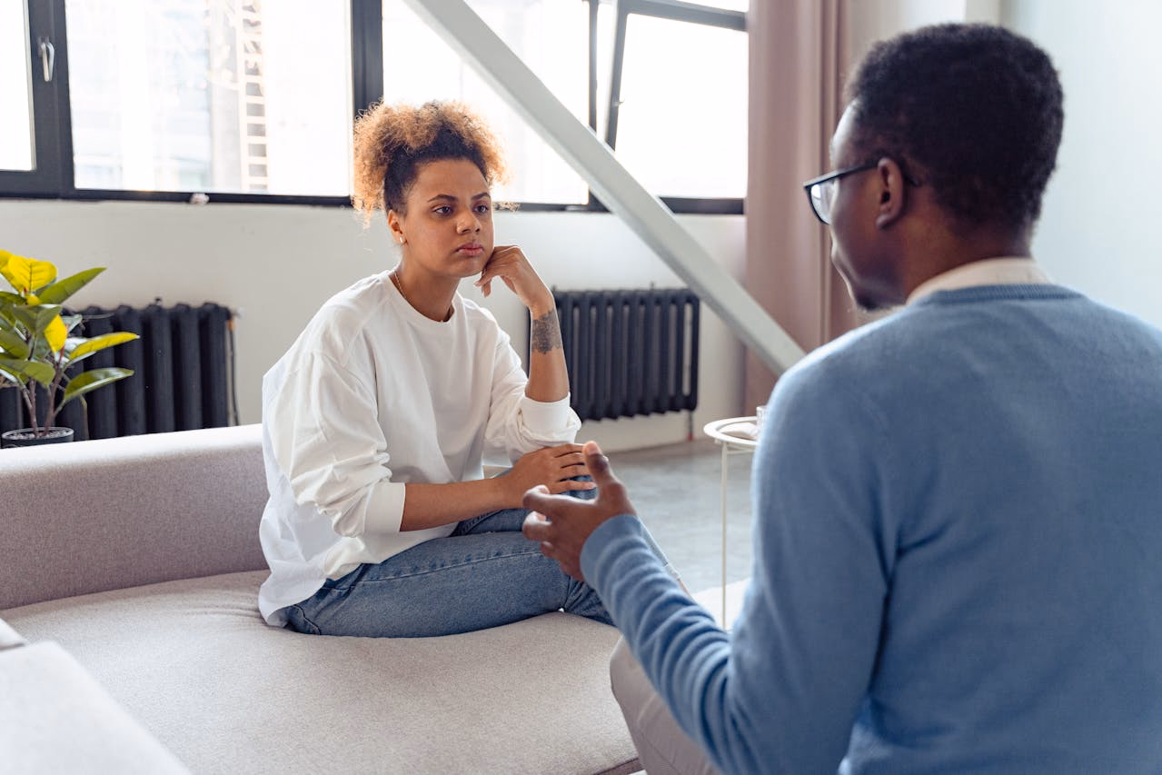 Patient listening attentively during a psychiatric consultation in a bright room